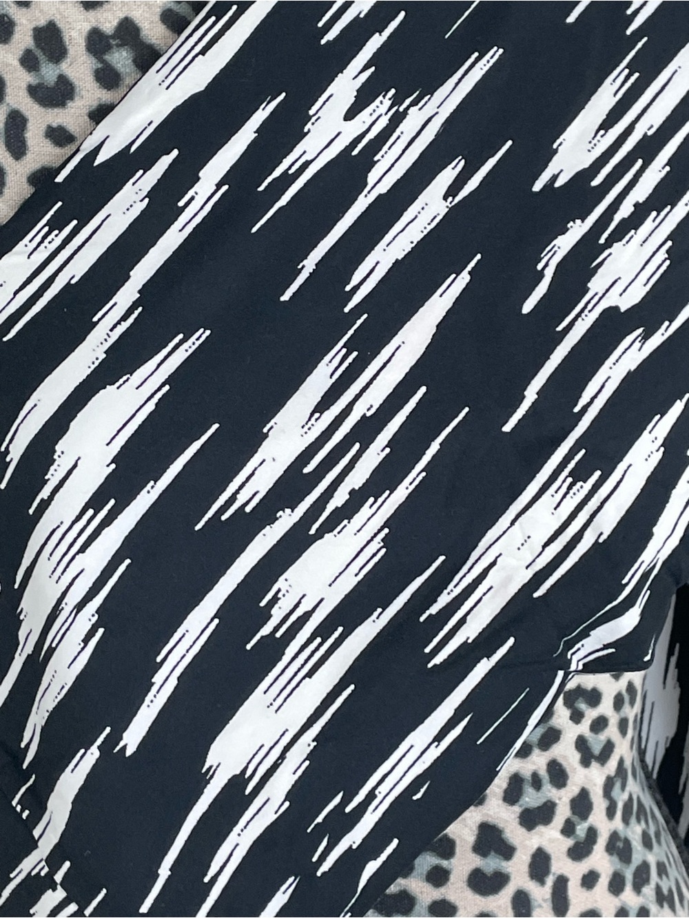 LuLaRoe Black Top with White Abstract Brushstroke Print